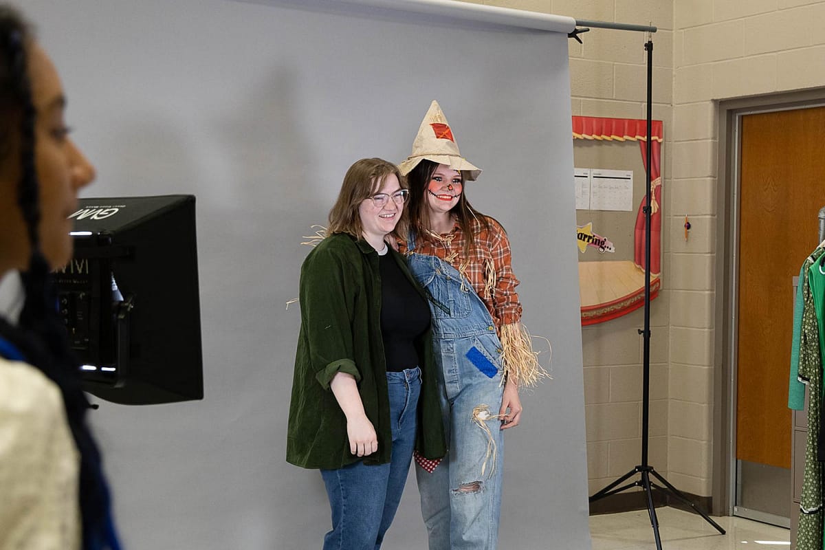 Musical Director of "Wizard of Oz," Harlie Delay, AHS Class of 2019, poses for media photos with her younger sister, sophomore Kenlie Delay. Harlie is directing the AHS Musical for the first time while her sister will be playing the part of Scarecrow in the show which runs this week at the AHS auditorium.