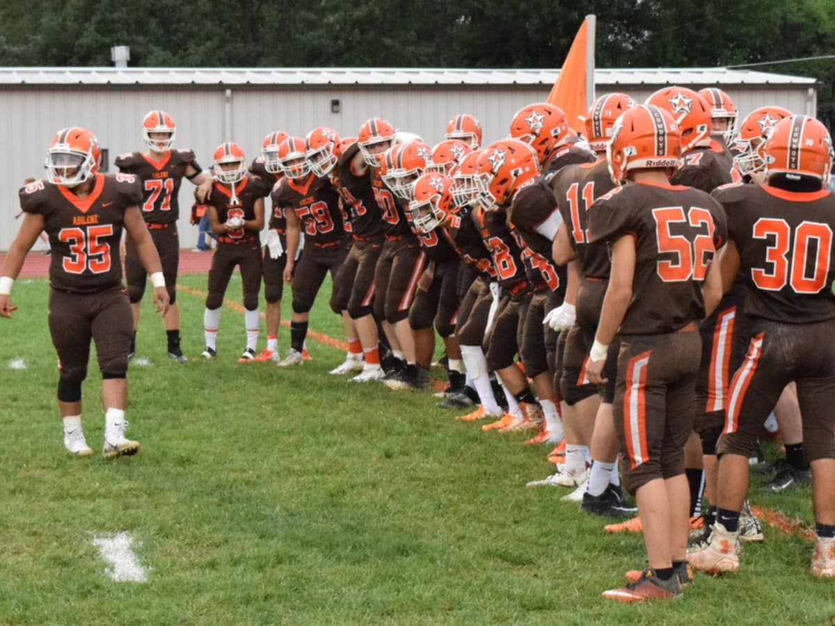 Senior David Pinedo (35) hypes up the Cowboys before a game. (I/C: Dave Linn)