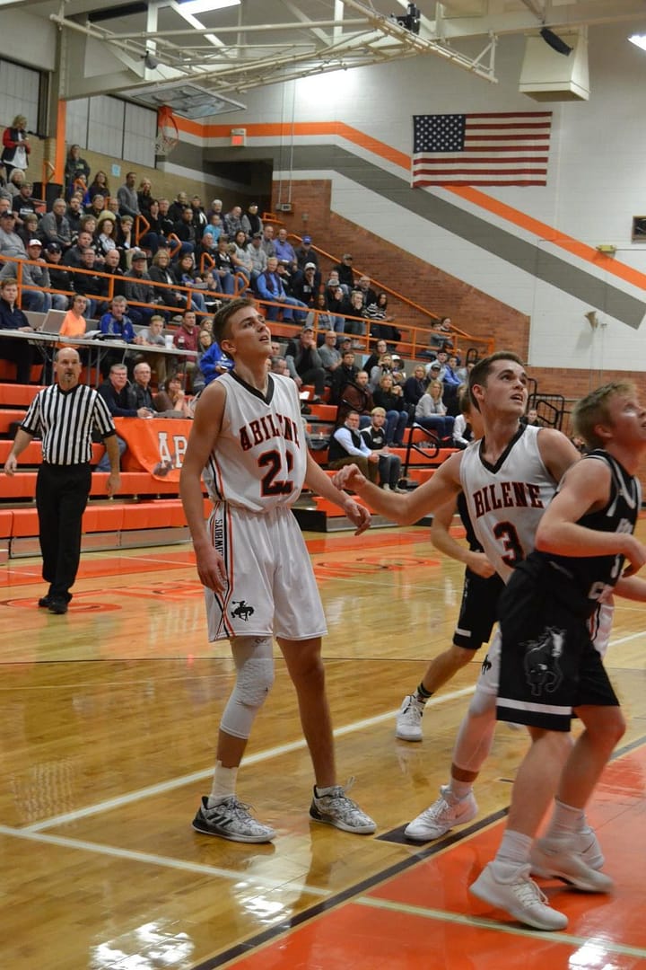 Travis Beetch (Jr.) and Damian Hartman (Sr.) prepare for a rebound.